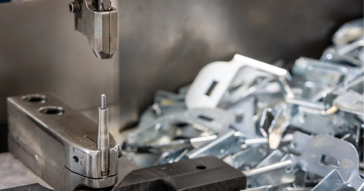 Metal stamping press producing precision steel components